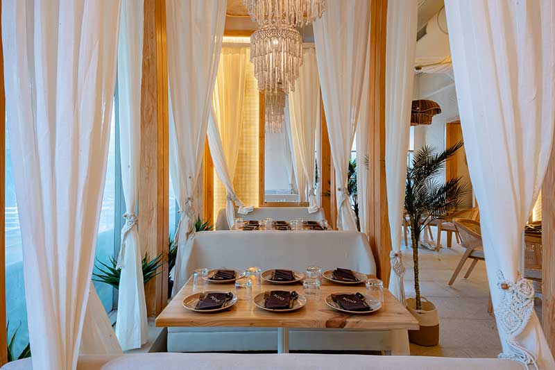 Cosy dining space at Koa Restaurant - best restaurants near me in Thane" | "Romantic dinner setup at fine dining restaurants near me" | "Family-friendly atmosphere at places to eat near me in Thane" | "Business lunch setting at top restaurants near me