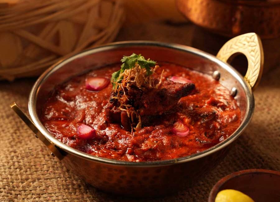 Signature Ghati Lamb Sheekh at Koa - best non veg restaurants in Thane" | "Premium meat dishes at top non veg hotel in Thane West" | "Clay oven preparation at Koa - best non veg restaurants near Thane Station" | "Festive non-veg thali at Koa Restaurant showcasing Thane's finest